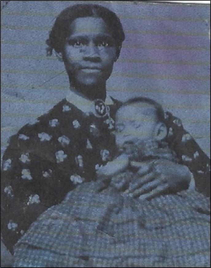 Black and white 19th century photograph showing a woman holding a baby